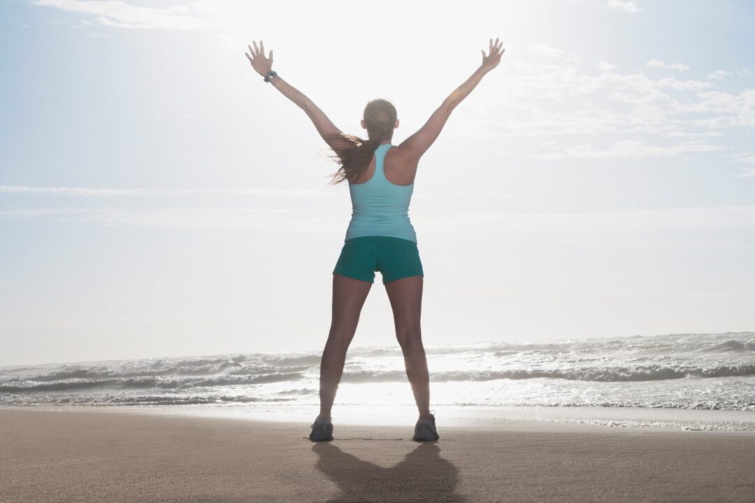 Active woman on a beach.