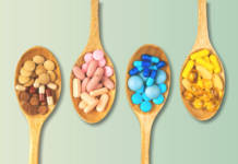Mix of dietary supplements and OTC health products on wooden spoons