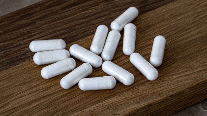 close-up of n-acetyl cysteine (NAC) capsules. dietary concept. dietary supplement selective focus photo.